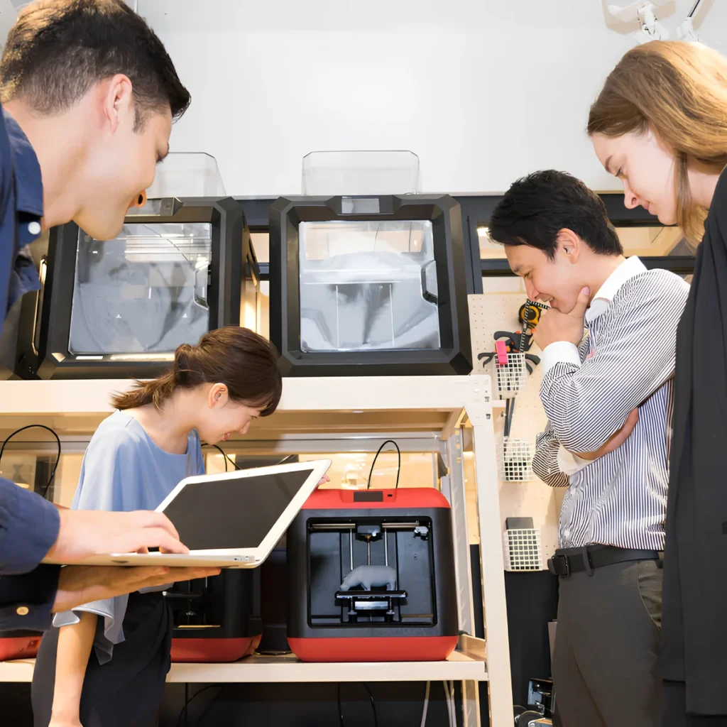 Team analyzing ceramic mold quality in an industrial setting.